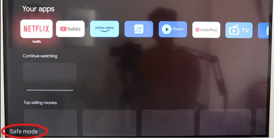 TV screen showing Safe Mode indicator.