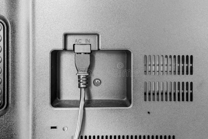 Back of Element TV with power cord plugged in.