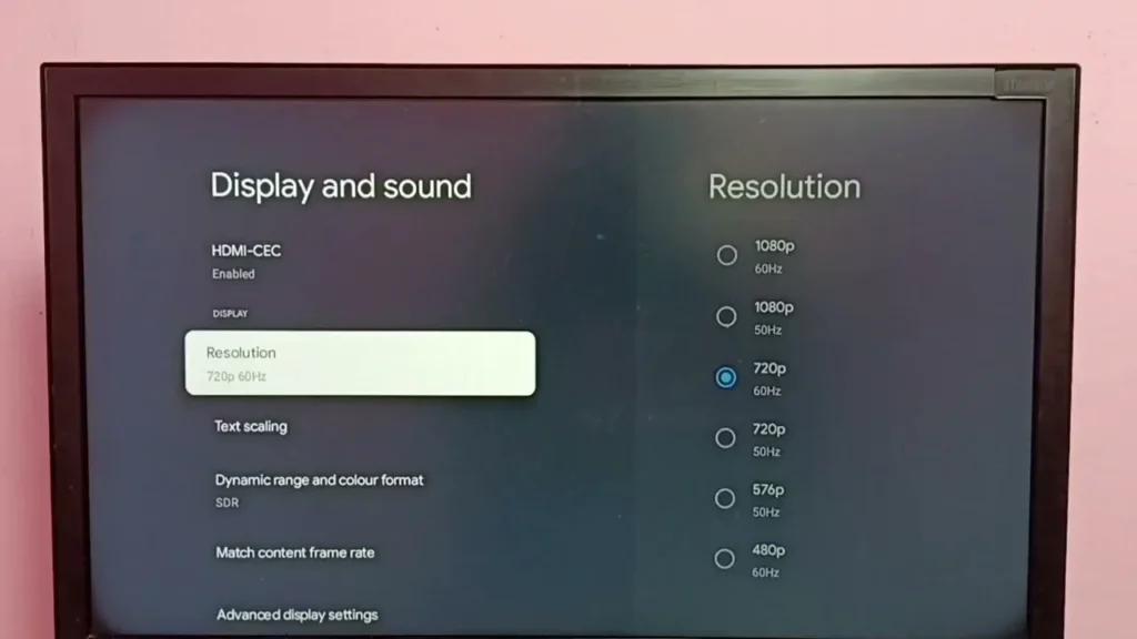 TCL Android TV settings menu with resolution and refresh rate.