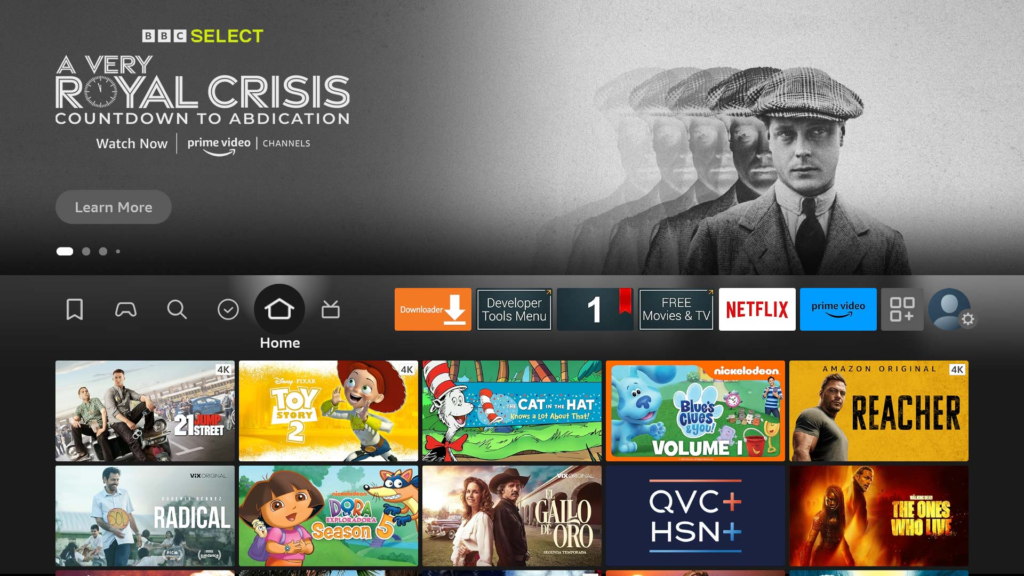 Amazon Fire Stick connected to TV showing home screen.