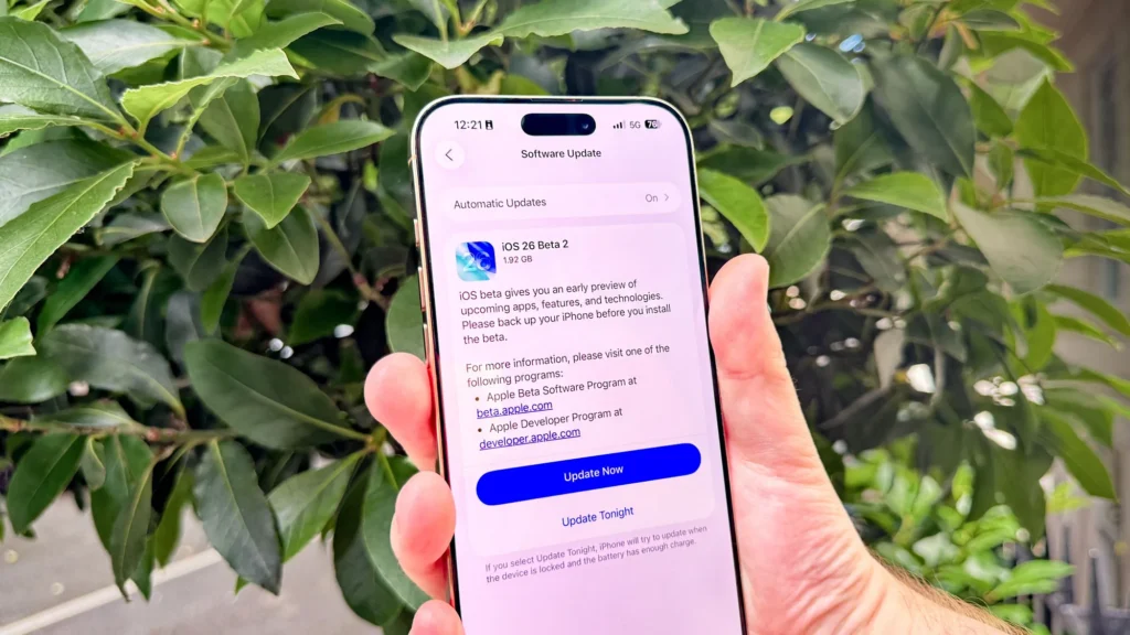 iPhone showing iOS 26 Beta 2 software update.