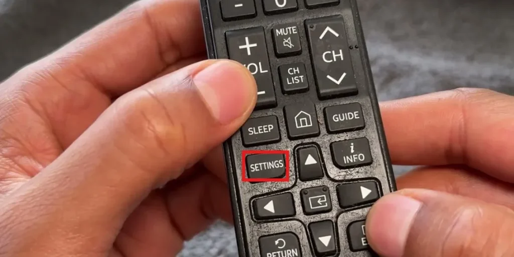 TV remote with settings button