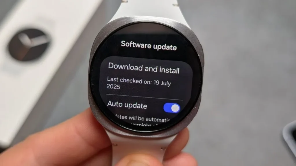 Samsung Galaxy Watch 8 on wrist showing software update notification.