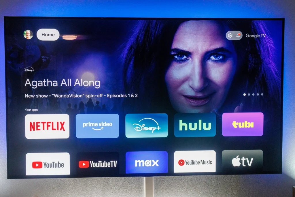 Modern TV screen running Google TV apps